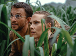 Jonathan Bailey as paleontologist Dr Henry Loomis and Scarlett Johansson as skilled covert operations expert Zora Bennett in Jurassic World Rebirth, directed by Gareth Edwards. Photo: Jasin Boland. Copyright: Universal Pictures and Amblin Entertainment. All Rights Reserved.