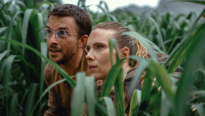 Jonathan Bailey as paleontologist Dr Henry Loomis and Scarlett Johansson as skilled covert operations expert Zora Bennett in Jurassic World Rebirth, directed by Gareth Edwards. Photo: Jasin Boland. Copyright: Universal Pictures and Amblin Entertainment. All Rights Reserved.
