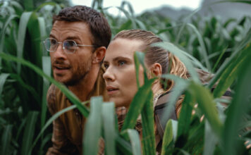 Jonathan Bailey as paleontologist Dr Henry Loomis and Scarlett Johansson as skilled covert operations expert Zora Bennett in Jurassic World Rebirth, directed by Gareth Edwards. Photo: Jasin Boland. Copyright: Universal Pictures and Amblin Entertainment. All Rights Reserved.