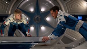 Joseph Quinn as Johnny Storm/Human Torch and Pedro Pascal as Reed Richards/Mister Fantastic in The Fantastic Four: First Steps, directed by Matt Shakman. Photo: Jay Maidment. Copyright: 20th Century Studios. All Rights Reserved. MT and Copyright 2025 Marvel.
