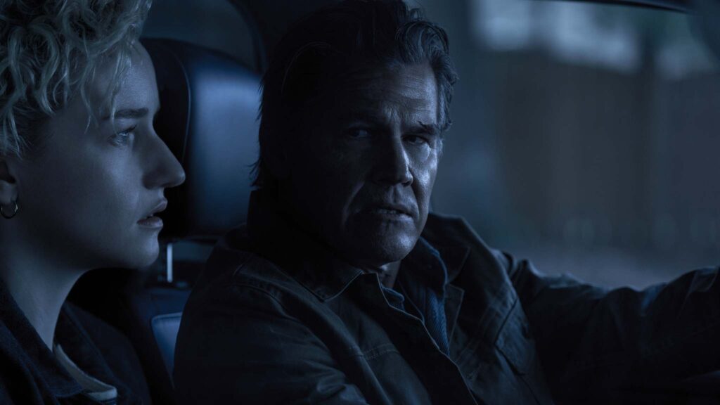 Julia Garner as Justine and Josh Brolin as Archer in Weapons, directed by Zach Cregger. Photo: Quantrell Colbert. Copyright: Warner Bros. Entertainment Inc. All Rights Reserved.