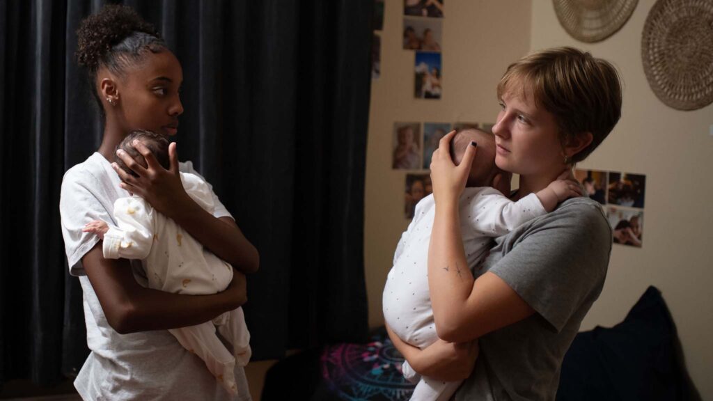 Lucie Laruelle as Perla and Janaina Halloy as Ariane in Young Mothers, directed by Luc Dardenne and Jean-Pierre Dardenne. Photo: Christine Plenus. Copyright: Curzon. All Rights Reserved.