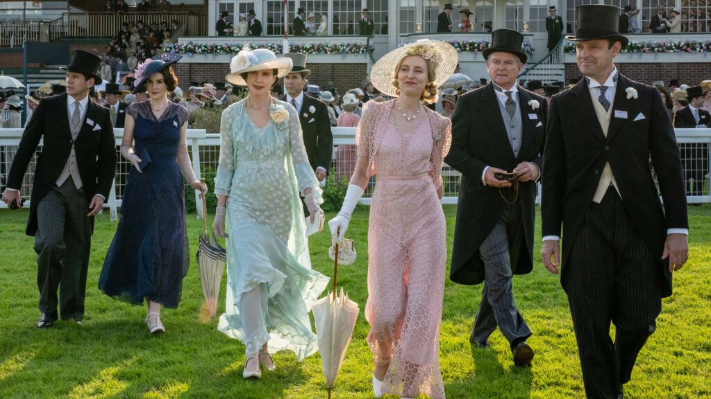 Allen Leech as Tom Branson, Michelle Dockery as Lady Mary, Elizabeth McGovern as Cora Grantham, Alessandro Nivola as Gus Sambrook, Laura Carmichael as Lady Edith, Hugh Bonneville as Robert Grantham and Harry Hadden-Paton as Bertie Hexham in Downton Abbey: The Grand Finale, directed by Simon Curtis. Photo: Rory Mulvey. Copyright: Focus Features LLC. All Rights Reserved.