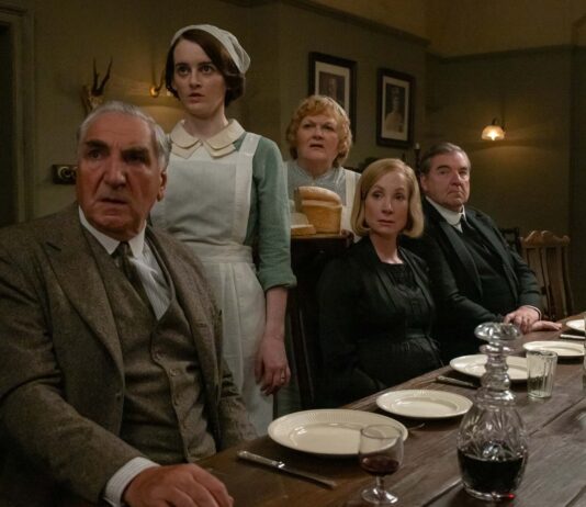Jim Carter as Mr Carson, Sophie McShera as Daisy Parker, Lesley Nicol as Mrs Patmore, Joanne Froggatt as Anna Bates and Brendan Coyle as Mr Bates in Downton Abbey: The Grand Finale, directed by Simon Curtis. Photo: Rory Mulvey. Copyright: Focus Features LLC. All Rights Reserved.