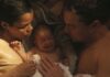 Teyana Taylor as Perfidia And Leonardo DiCaprio as Bob Ferguson in One Battle After Another, directed by Paul Thomas Anderson. Copyright: Warner Bros. Pictures. All Rights Reserved.