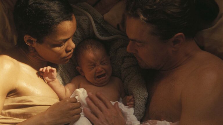 Teyana Taylor as Perfidia And Leonardo DiCaprio as Bob Ferguson in One Battle After Another, directed by Paul Thomas Anderson. Copyright: Warner Bros. Pictures. All Rights Reserved.