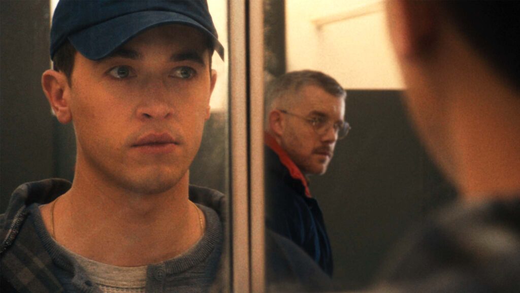 Tom Blyth as Lucas and Russell Tovey as Andrew in Plainclothes, directed by Carmen Emmi. Copyright: Curzon. All Rights Reserved.
