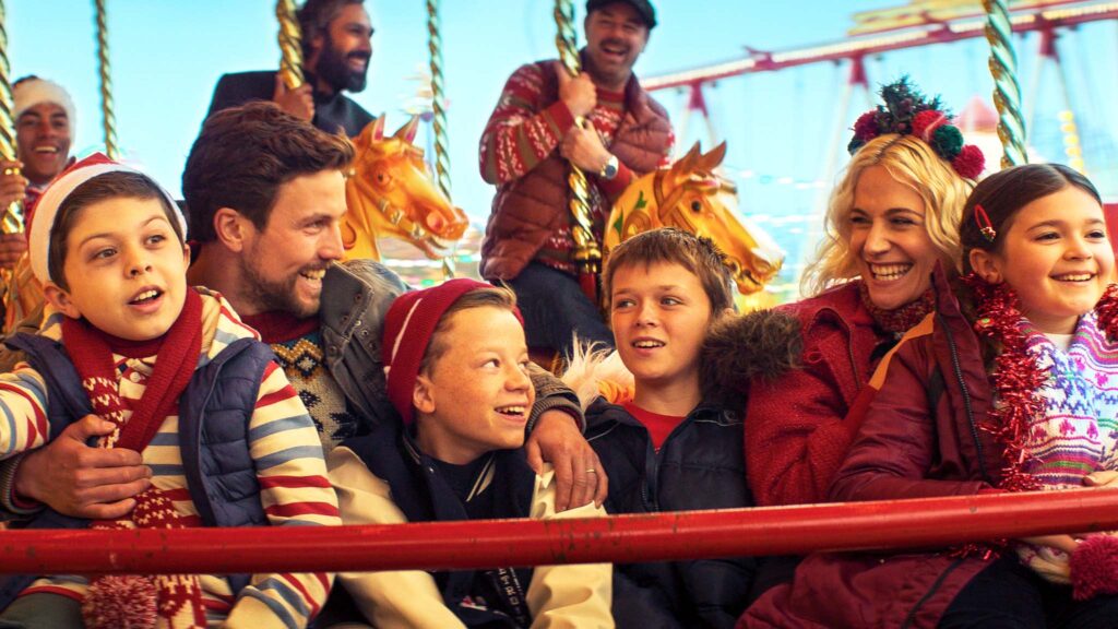 Leo Suter as Bob Cratchit and Pixie Lott as Mary Cratchit in Christmas Karma, directed by Gurinder Chadha. Copyright: True Brit. All Rights Reserved.