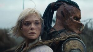 Elle Fanning as Thia and Dimitrius Schuster-Koloamatangi as Dek in Predator: Badlands, directed by Dan Trachtenberg. Copyright: 20th Century Studios. All Rights Reserved.
