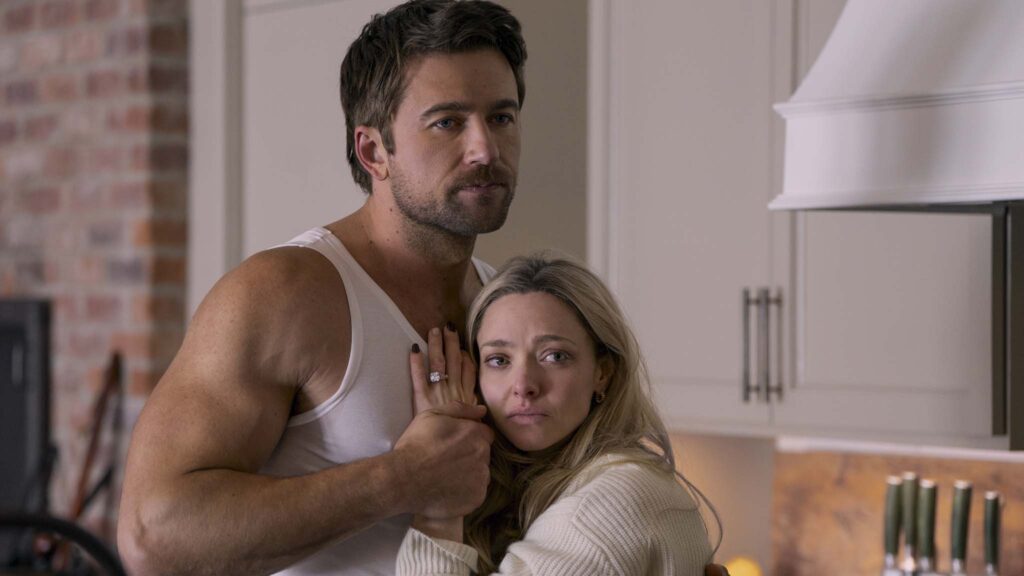 Brandon Sklenar as Andrew Winchester and Amanda Seyfried as Nina Winchester in The Housemaid, directed by Paul Feig. Photo: Daniel McFadden. Copyright: Lionsgate. All Rights Reserved.