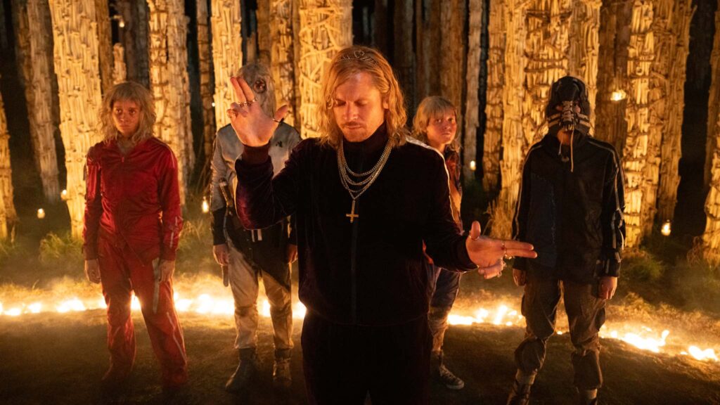 Jack O'Connell as Sir Jimmy Crystal with the Jimmies in 28 Years Later: The Bone Temple., directed by Nia DaCosta. Photo: Miya Mizuno. Copyright: CTMG, Inc. All Rights Reserved.