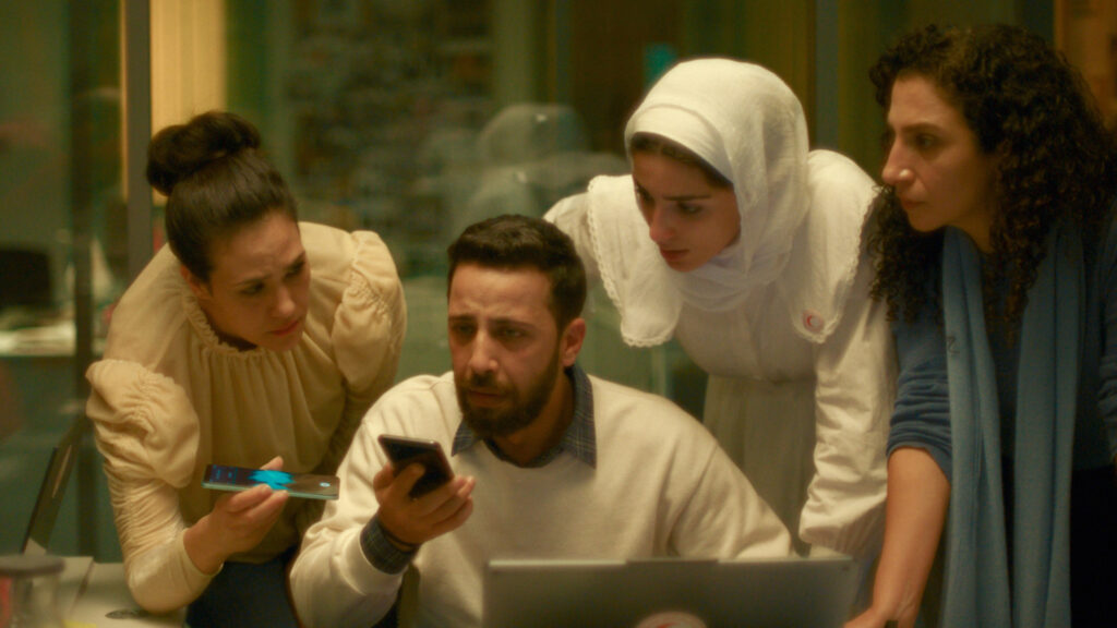Saja Kilani as Rana Hassan Faqih, Motaz Malhees as Omar A Alqam and Clara Khoury as Nisreen Jeries Qawas in The Voice Of Hind Rajab, directed by Kaouther Ben Hania. Copyright: Willa Productions/Altitude Film Distribution. All Rights Reserved.