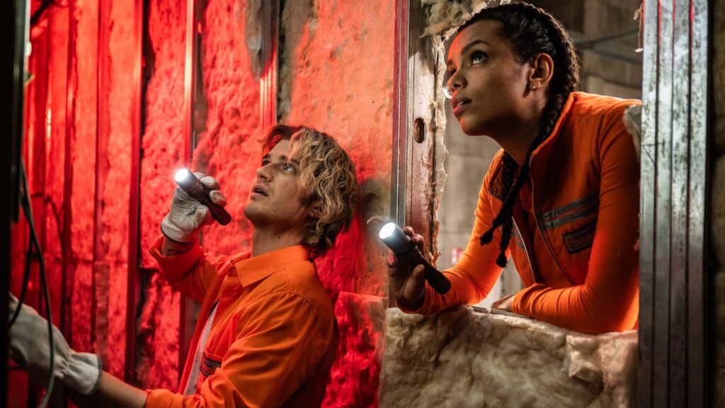 Georgina Campbell as Naomi Williams and Joe Keery as Travis Meacham in Cold Storage, directed by Jonny Campbell. Photo: Reiner Bajo. Copyright: StudioCanal. All Rights Reserved.