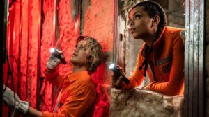 Georgina Campbell as Naomi Williams and Joe Keery as Travis Meacham in Cold Storage, directed by Jonny Campbell. Photo: Reiner Bajo. Copyright: StudioCanal. All Rights Reserved.