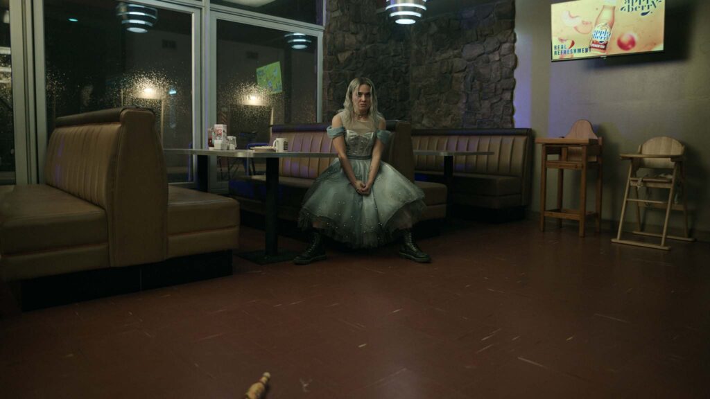 Haley Lu Richardson as Ingrid in Good Luck, Have Fun, Don’t Die, directed by Gore Verbinski. Photo: Dean Rogers. Copyright: Briarcliff Entertainment/Entertainment Film Distributors. All Rights Reserved.