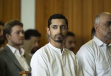 Joe Alwyn as Laertes, Riz Ahmed as Prince Hamlet and Art Malik as Claudius in Hamlet, directed by Aneil Karia. Copyright: Universal Studios. All Rights Reserved.