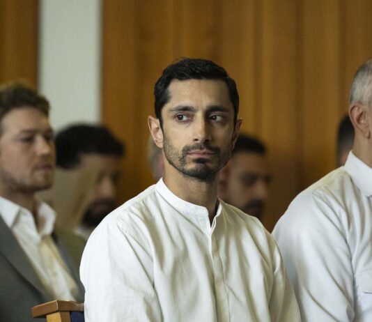Joe Alwyn as Laertes, Riz Ahmed as Prince Hamlet and Art Malik as Claudius in Hamlet, directed by Aneil Karia. Copyright: Universal Studios. All Rights Reserved.