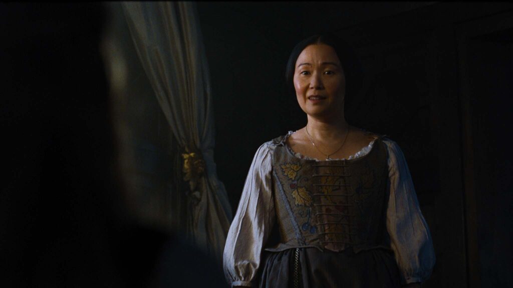 Hong Chau as Nelly Dean in Wuthering Heights, directed by Emerald Fennell. Copyright: Warner Bros. Entertainment. All Rights Reserved.