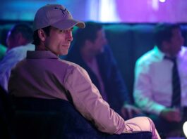 Glen Powell as Becket Redfellow in How To Make A Killing, directed by John Patton Ford. Photo: Ilze Kitshoff. Copyright: StudioCanal. All Rights Reserved.