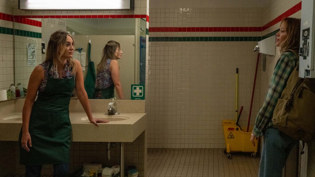 Lainey Wilson as Amy Matthews and Maika Monroe as Kenna Rowan in Reminders Of Him, directed by Vanessa Caswill. Photo: Michelle Faye. Copyright: Universal Pictures. All Rights Reserved.