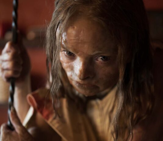 Natalie Grace as Katie in Lee Cronin’s The Mummy, directed by Lee Cronin. Photo: Patrick Redmond. Copyright: Warner Bros. Entertainment Inc. All Rights Reserved.