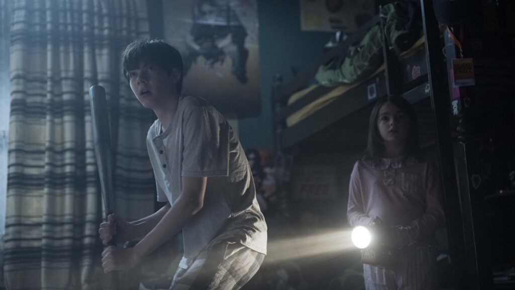 Shylo Molina as Sebastian Cannon and Billie Roy as Maud Cannon in Lee Cronin’s The Mummy, directed by Lee Cronin. Photo: Patrick Redmond. Copyright: Warner Bros. Entertainment Inc. All Rights Reserved.