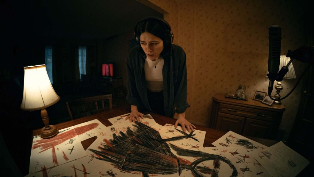 Nina Kiri as Evy in Undertone, directed by Ian Tuason. Copyright: A24. All Rights Reserved.