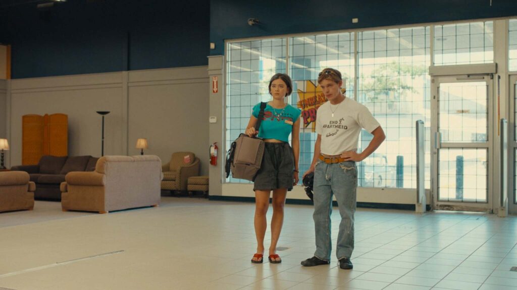 Lukita Maxwell as Kat and Finn Bennett as Bobby in Backrooms, directed by Kane Parsons. Copyright: A24. All Rights Reserved.