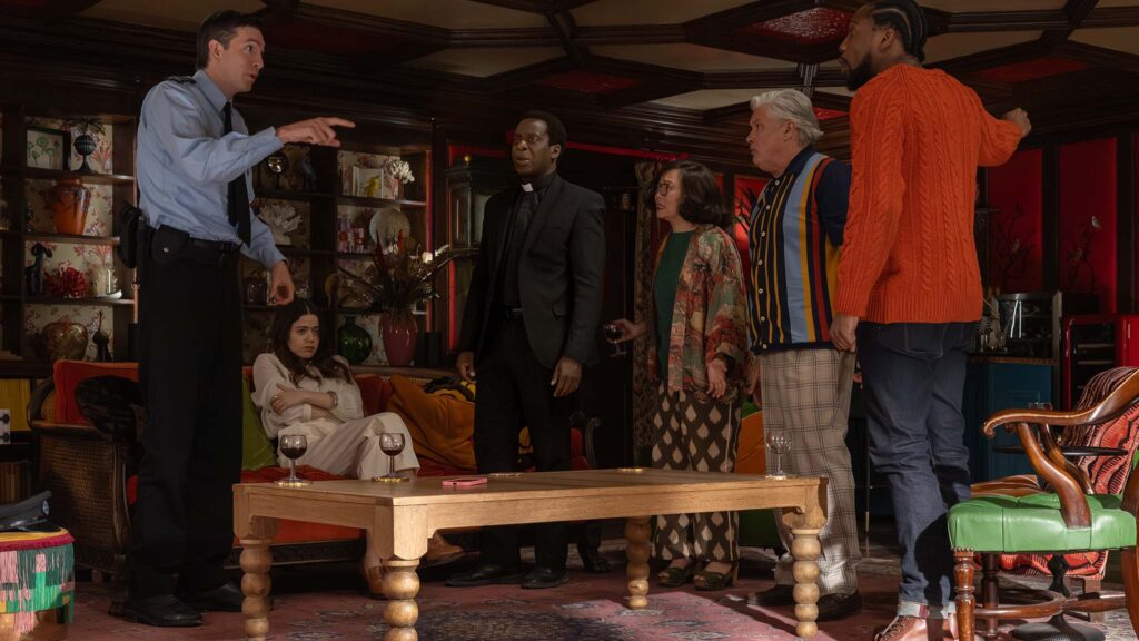 Nicholas Braun stars as Officer Tim Derry, Molly Gordon as Rebecca Hampstead, Kobna Holbrook-Smith as Reverend Hillcoate, Hong Chau as Beth Pennock, Conleth Hill as Ham Gilyard and Tosin Cole as Caleb Merrow in The Sheep Detectives, directed by Kyle Balda. Photo: Alex Bailey. Copyright: Amazon Content Services LLC. All Rights Reserved.
