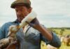 Tommy Birchall as the voice of The Winter Lamb and Hugh Jackman as George Hardy in The Sheep Detectives, directed by Kyle Balda. Copyright: Amazon Content Services LLC. All Rights Reserved.