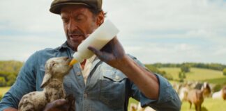 Tommy Birchall as the voice of The Winter Lamb and Hugh Jackman as George Hardy in The Sheep Detectives, directed by Kyle Balda. Copyright: Amazon Content Services LLC. All Rights Reserved.