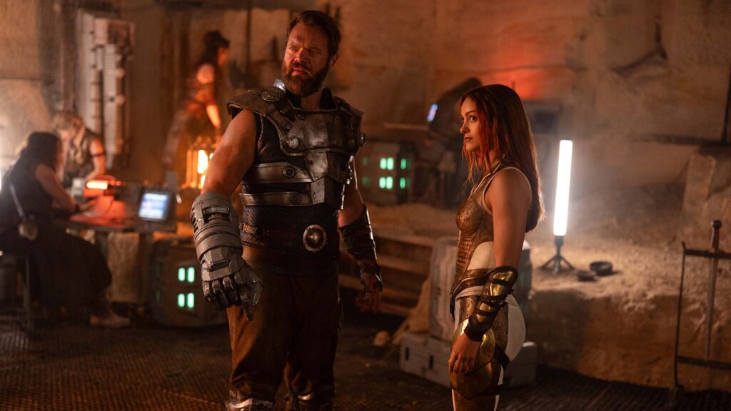 Johannes Haukur Johannesson as Fisto and Camila Mendes as Teela in Masters Of The Universe, directed by Travis Knight. Photo: Giles Keyte. Copyright: Amazon MGM Studios Content Services LLC. All Rights Reserved..
