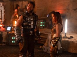 Johannes Haukur Johannesson as Fisto and Camila Mendes as Teela in Masters Of The Universe, directed by Travis Knight. Photo: Giles Keyte. Copyright: Amazon MGM Studios Content Services LLC. All Rights Reserved..