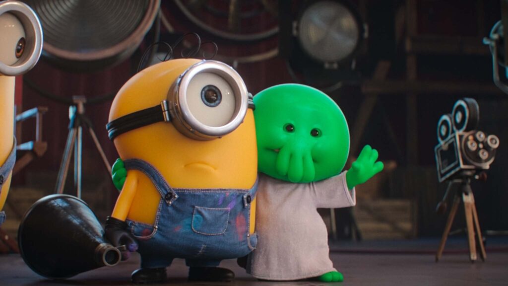 James (voiced by Pierre Coffin) and Goomi (Trey Parker) in Minions & Monsters, directed by Pierre Coffin. Copyright: Illumination/Universal Studios. All Rights Reserved.