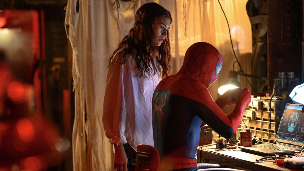 Zendaya as MJ watches Spider-Man work in Spider-Man: Brand New Man, directed by Destin Daniel Cretton. Photo: Jay Maidment. Copyright: 2026 CTMG. All Rights Reserved. Marvel and all related character names: Copyright 2026 Marvel.