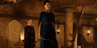 Mia Goth as Melantho and Anne Hathaway as Penelope in The Odyssey, directed by Christopher Nolan. Photo: Melinda Sue Gordon. Copyright: Universal Studios. All Rights Reserved.