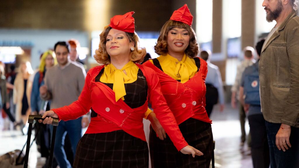 Ginger Minj as Tess and Jujubee as DeeDee in Stop! That! Train!, directed by Adam Shankman. Copyright: Universal Pictures/World Of Wonder. All Rights Reserved.