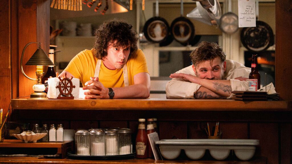 Dominic Sessa as Anthony Bourdain and Leo Woodall as Sal in Tony, directed by Matt Johnson. Copyright: A24. All Rights Reserved.