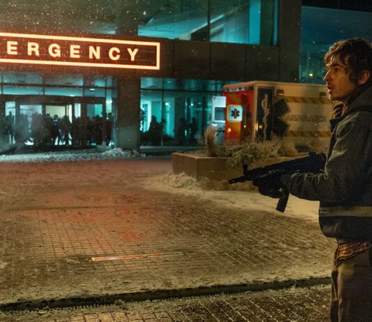 Austin Abrams as Bryan in Resident Evil, directed by Zach Cregger. Photo: Dušan Martinček. Copyright: CTMG, Inc.. All Rights Reserved.