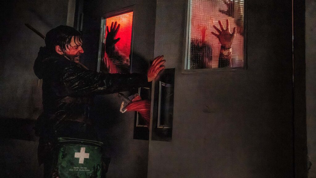 Austin Abrams as Bryan in Resident Evil, directed by Zach Cregger. Photo: Dušan Martinček. Copyright: CTMG, Inc.. All Rights Reserved.