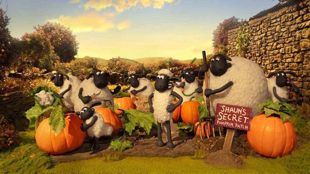 Timmy (voiced by Justin Fletcher), Shaun (Justin Fletcher) and the rest of the flock in the secret pumpkin patch in Shaun The Sheep: The Beast Of Mossy Bottom, directed by Steve Cox and Matthew Walker. Photo: Rediat Abayneh. Copyright: Aardman Animations Limited. All Rights Reserved.
