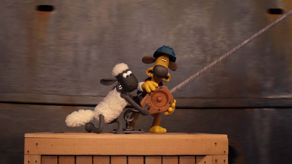 Shaun (voiced by Justin Fletcher) and Bitzer (John Sparkes) in Shaun The Sheep: The Beast Of Mossy Bottom, directed by Steve Cox and Matthew Walker. Photo: Rediat Abayneh. Copyright: Aardman Animations Limited. All Rights Reserved.