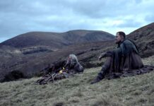 Hugh Jackman as Robin and Bill Skarsgard as Edward in The Death Of Robin Hood, directed by Michael Sarnoski. Photo: Aidan Monaghan. Copyright: DORH Holding Co LLC. All Rights Reserved.