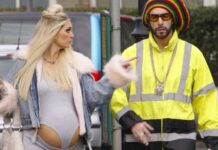 Morgana Robinson as Julie and Sacha Baron Cohen as Ali G in Ali G: Who Iz I?, directed by Sacha Baron Cohen. Copyright: Amazon Content Services LLC. All Rights Reserved.