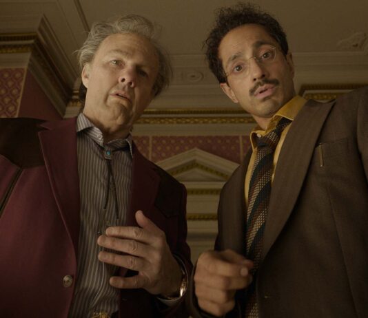 Tom Cruise as Rockwell and Riz Ahmed as Ganesh in Digger, directed by Alejandro González Iñárritu. Copyright: Warner Bros. Entertainment Inc. All Rights Reserved.