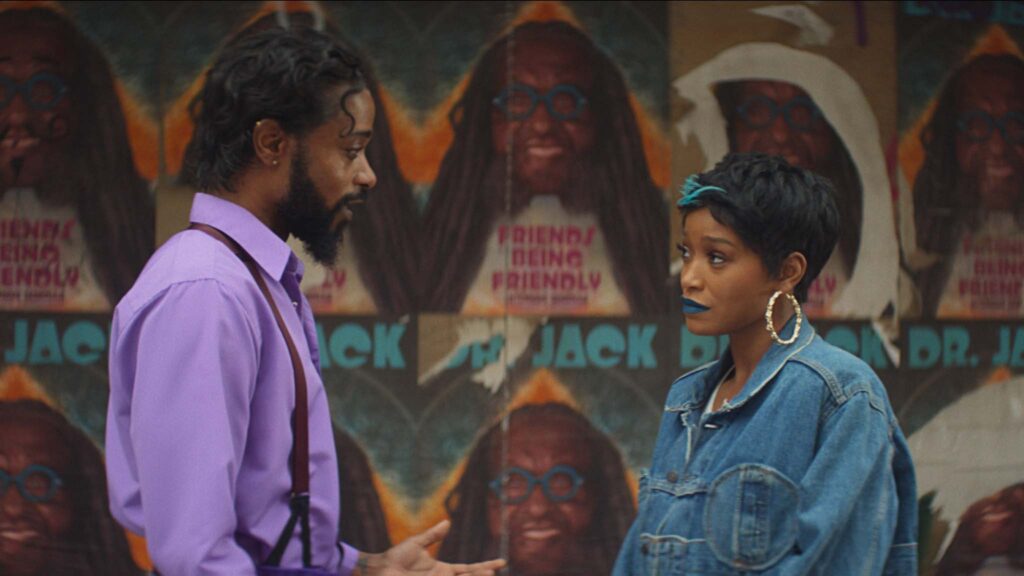 LaKeith Stanfield as Pinky Ring Guy and Keke Palmer as Corvette in I Love Boosters, directed by Boots Riley. Copyright: Neon. All Rights Reserved.