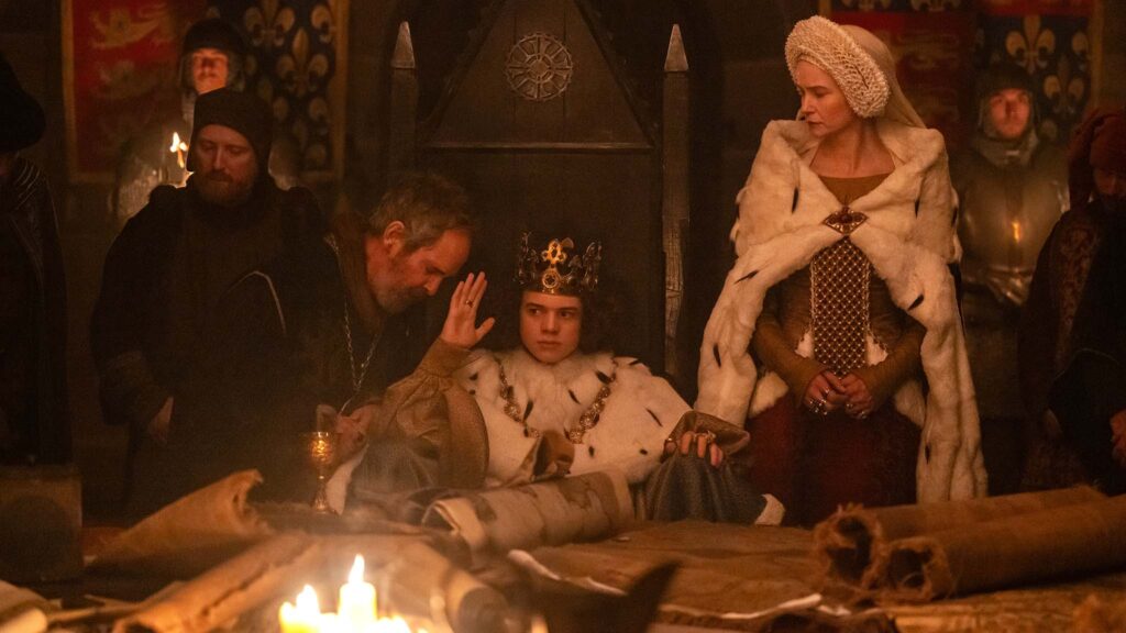 Tom Hollander as Treasurer Hales, Woody Norman as King RIchard II and Katherine Waterston as The Countess in The Uprising, directed by Paul Greengrass. Photo: Betina La Plante. Copyright: Focus Features, LLC. All Rights Reserved.